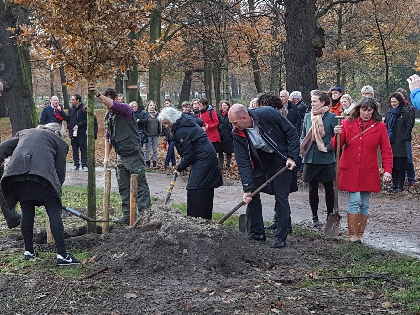 Family, friends and IRC staf planting a tree in memory of Ton Schouten