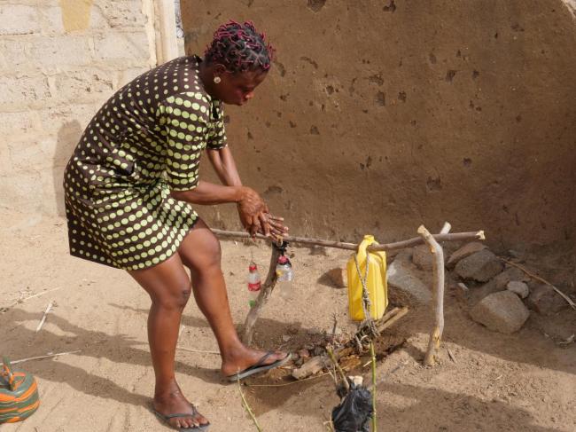 Using a simple handwashing device in Bongo, Ghana