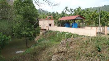 A community rehabilitated by the Nenmeni RWSS scheme in Kerala, India