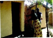 Moriyeta demonstrating how handwashing is done (© Plan Malawi)