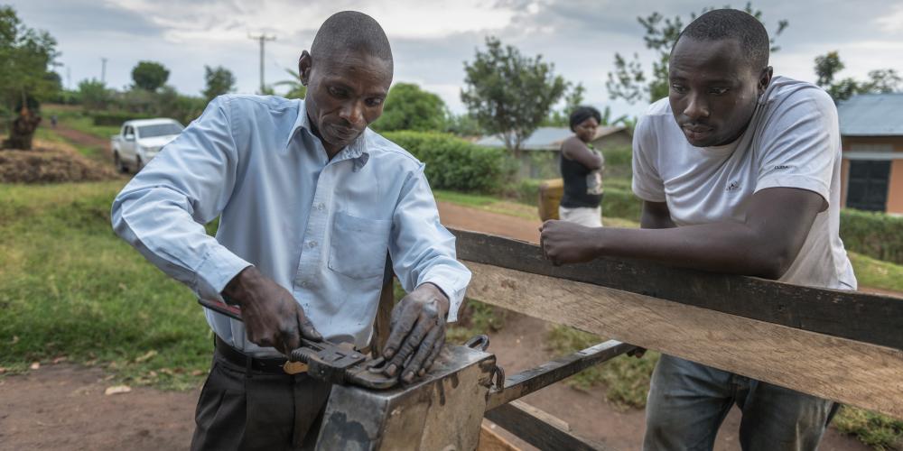 Fixing a handpump in Kabarole district Uganda