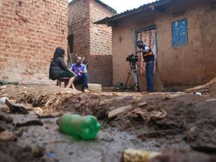 Kenneth Kavulu covering stories of WASH in Kampala, Uganda