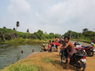 India - fetching water from river in Chatrapur block, Ganjam District, Odisha state