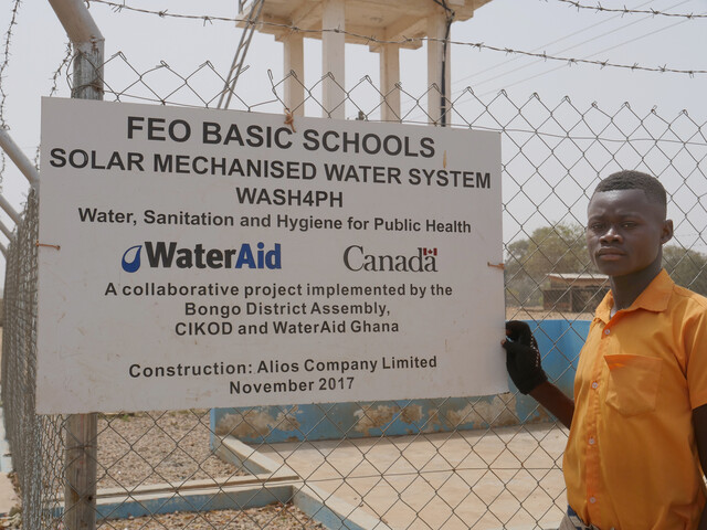 Phileman Azura, aged 15, a student at Foe Junior High School B at the solar mechanised water point