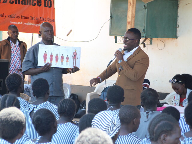 Daniel Karanja discussing menstruation in schools