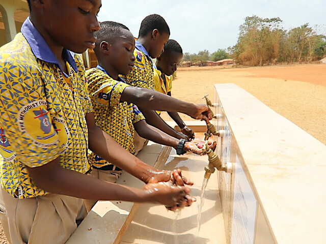 School children washing hands in Ghana