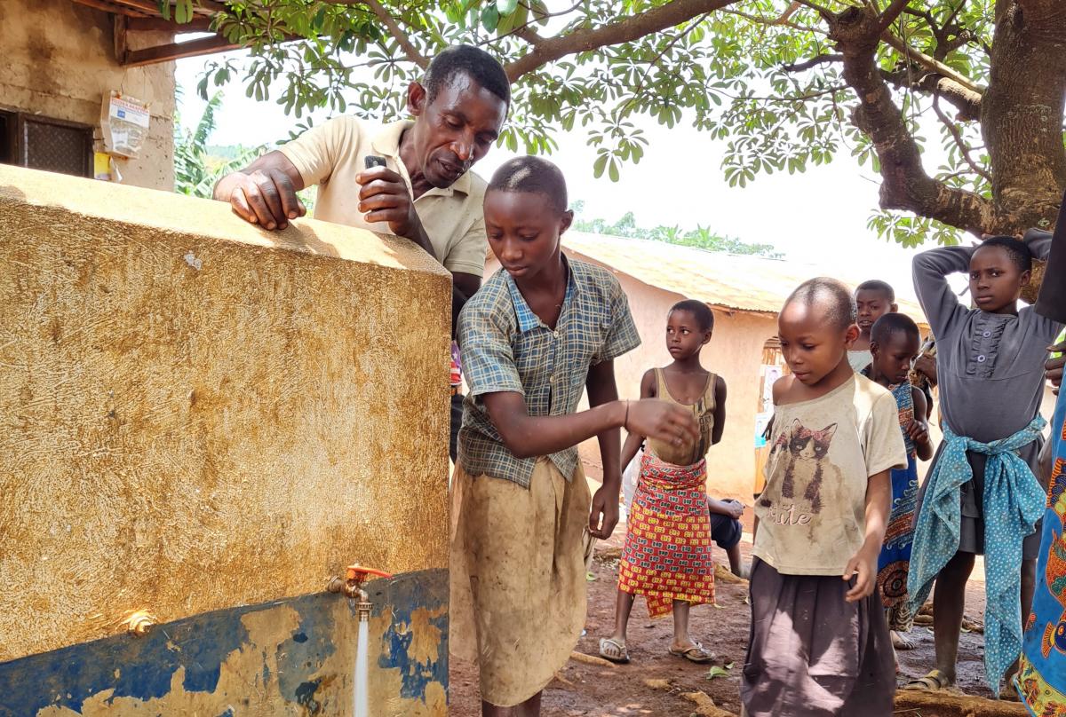 Children fetching water Kabende sub country Kabarole Uganda